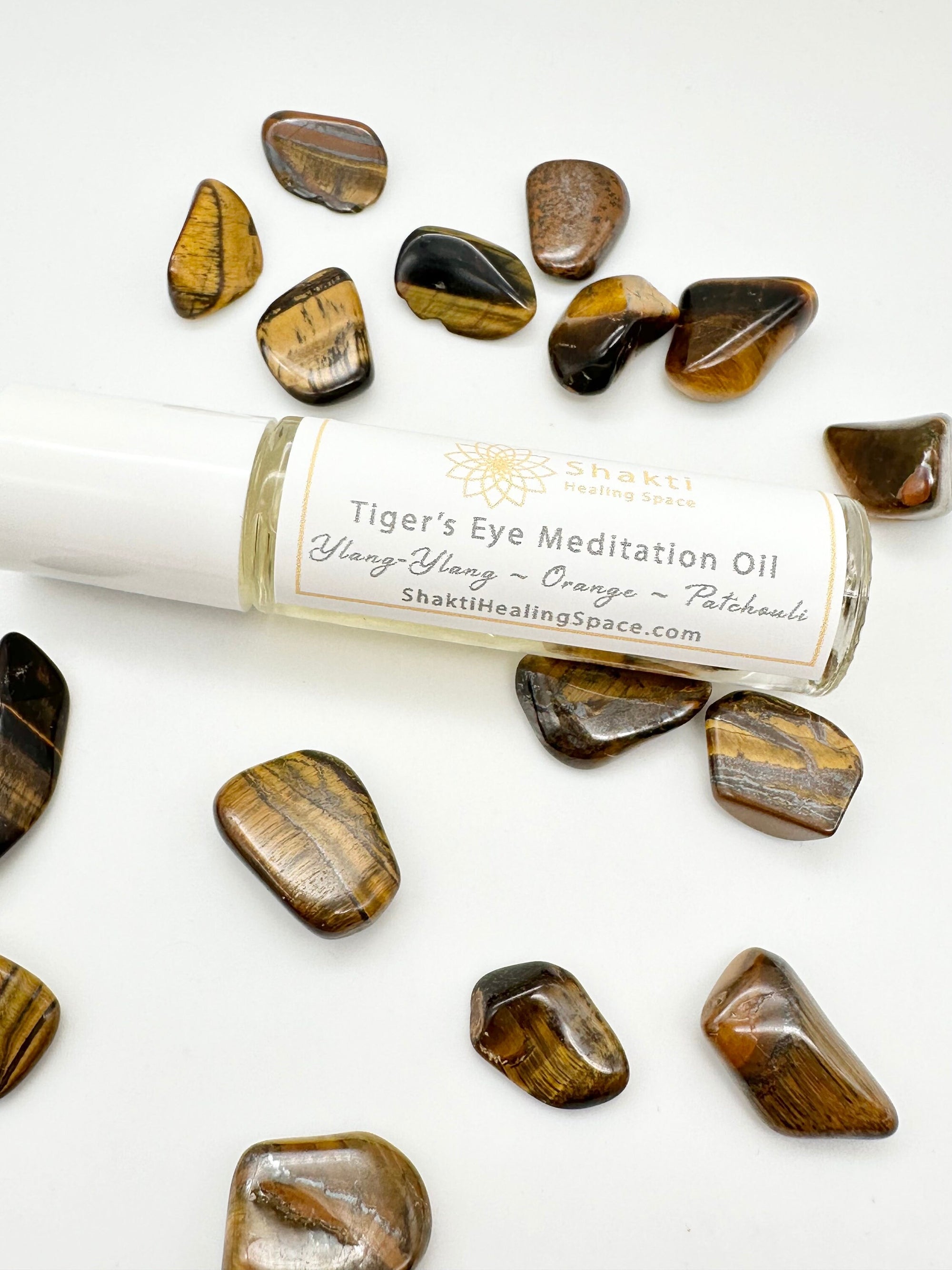 Tiger's eye stones in a meditation essential oil roller.