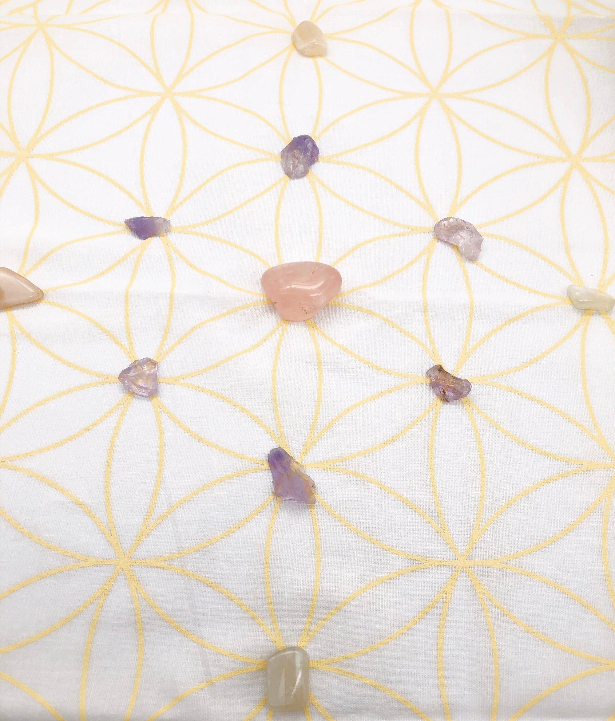 Healing crystals on sacred geometry altar cloth