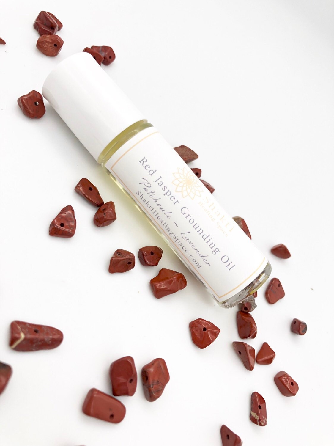 Lavender and patchouli essential oil roller with red jasper chips