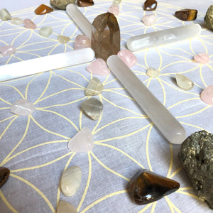 Crystal stones on flower of life grid cloth