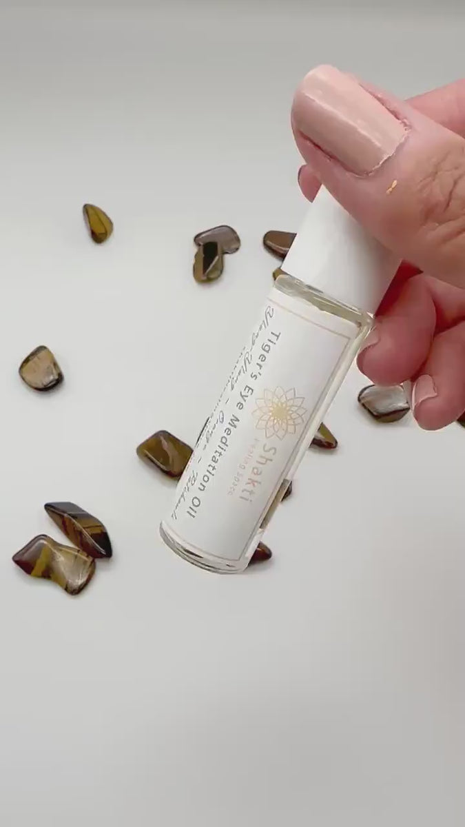 Meditation essential oil roller with tiger's eye stones.